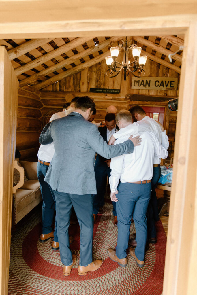 Groom getting ready spaces rustic cabin